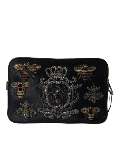 Elegante schwarze Lederclutch mit Bienenverzierung