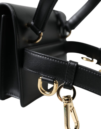 Elegante schwarze Ledergürteltasche mit goldenen Akzenten