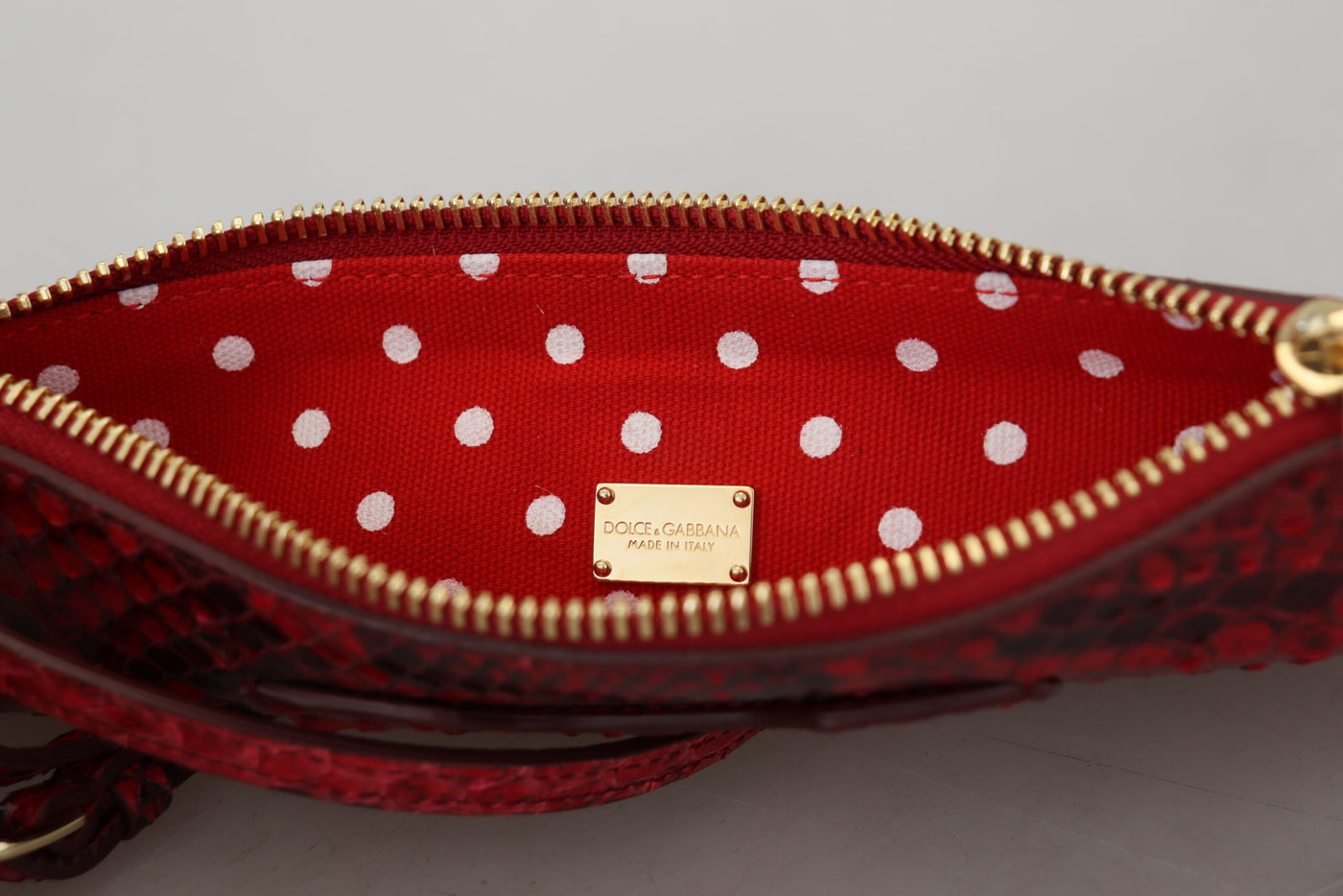 Elegante Ayers Schlangen-Clutch aus rotem Leder